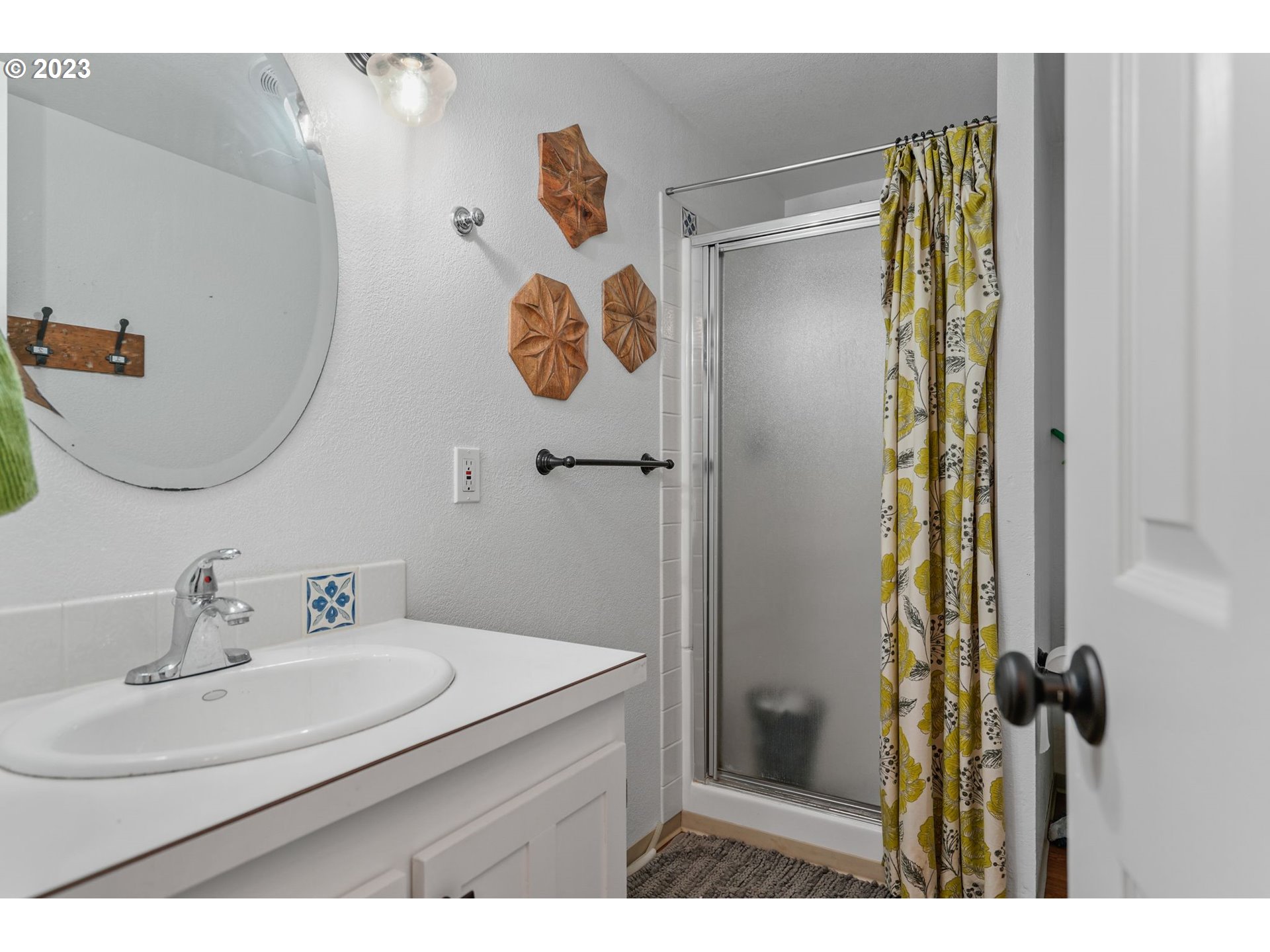 54795 Southwest Hebo Road Grand Ronde, OR 97347 - Photo 22 of 41 a bathroom with a sink and mirror
