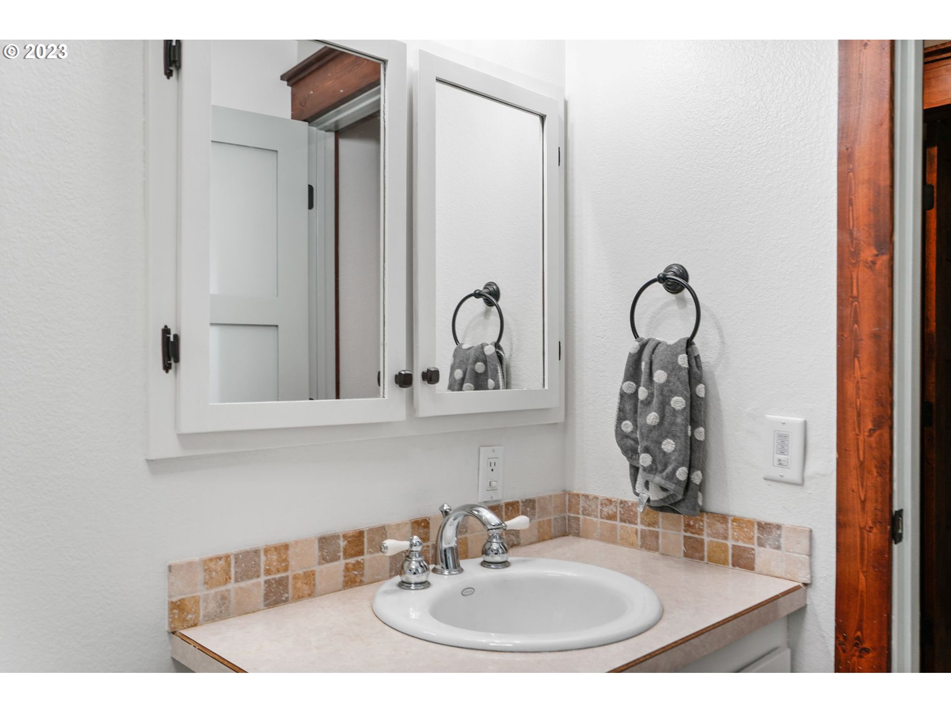 54795 Southwest Hebo Road Grand Ronde, OR 97347 - Photo 27 of 41 a bathroom with a sink and a mirror