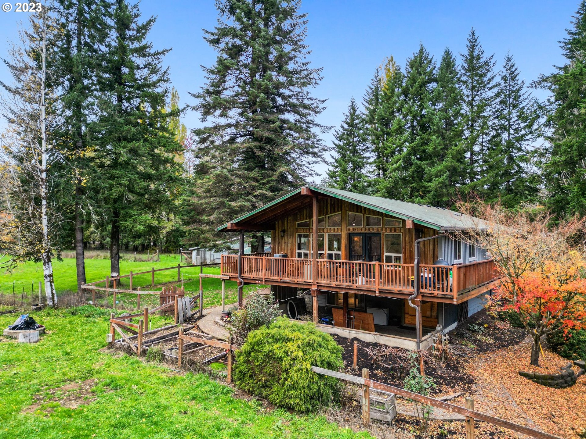54795 Southwest Hebo Road Grand Ronde, OR 97347 - Photo 29 of 41 a view of a house with a yard and furniture