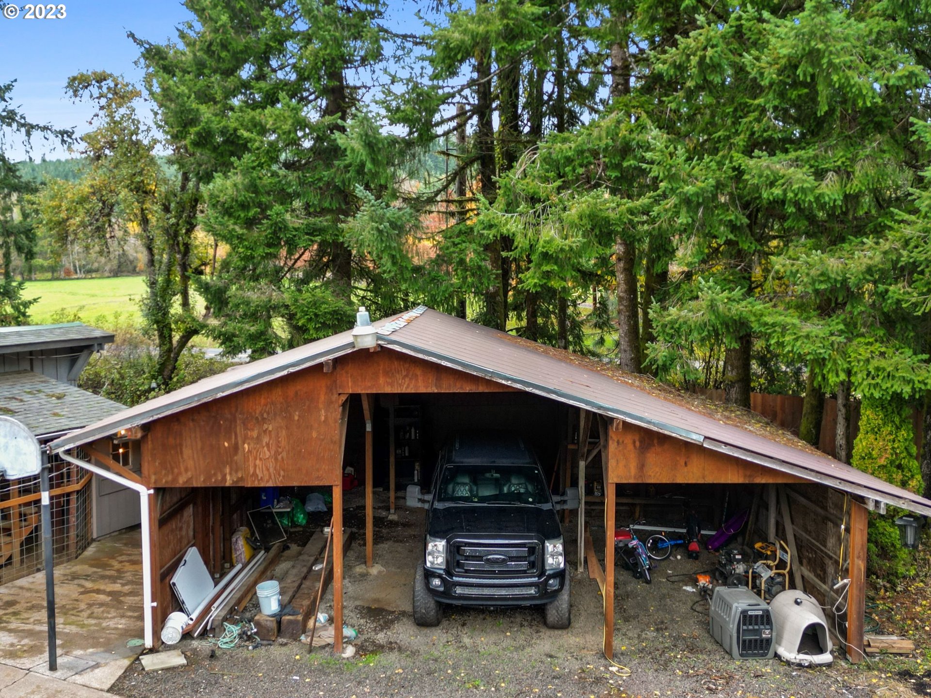 54795 Southwest Hebo Road Grand Ronde, OR 97347 - Photo 32 of 41 a view of a car park in front of house