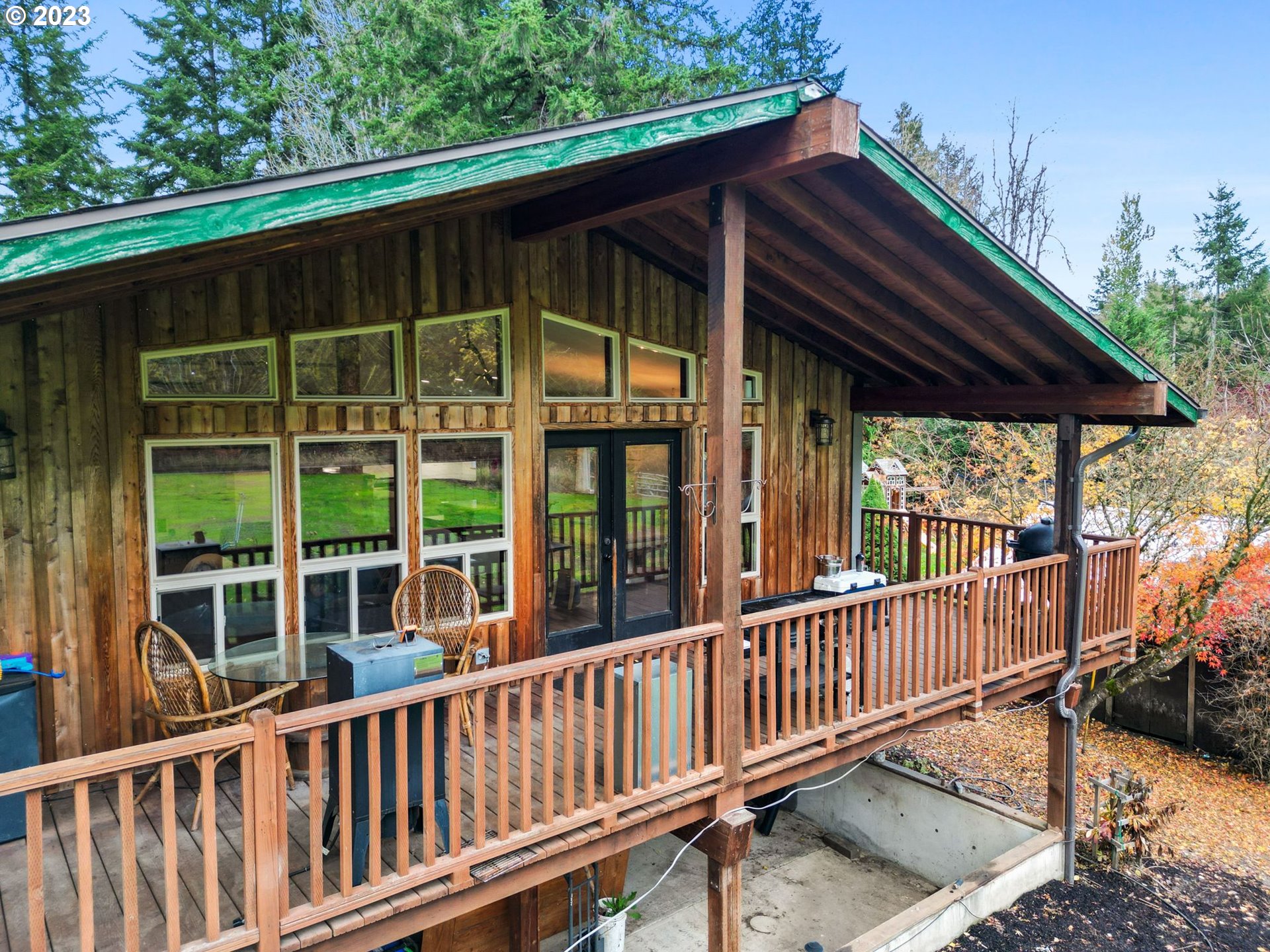 54795 Southwest Hebo Road Grand Ronde, OR 97347 - Photo 4 of 41 a view of a roof deck with wooden fence and floor