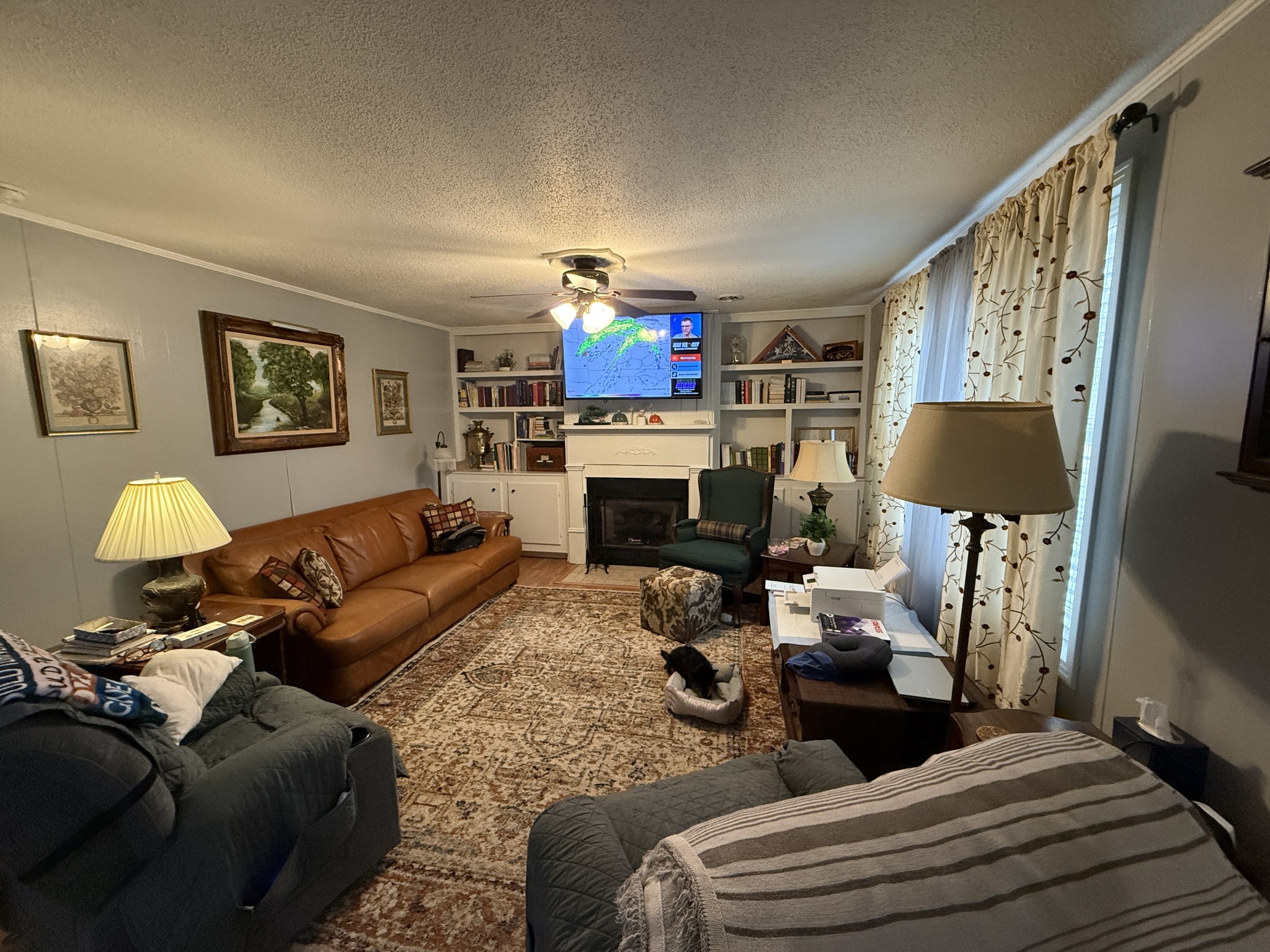 201 South Point Drive Camden, TN 38320 - Photo 12 of 30 a living room with furniture fireplace and a window