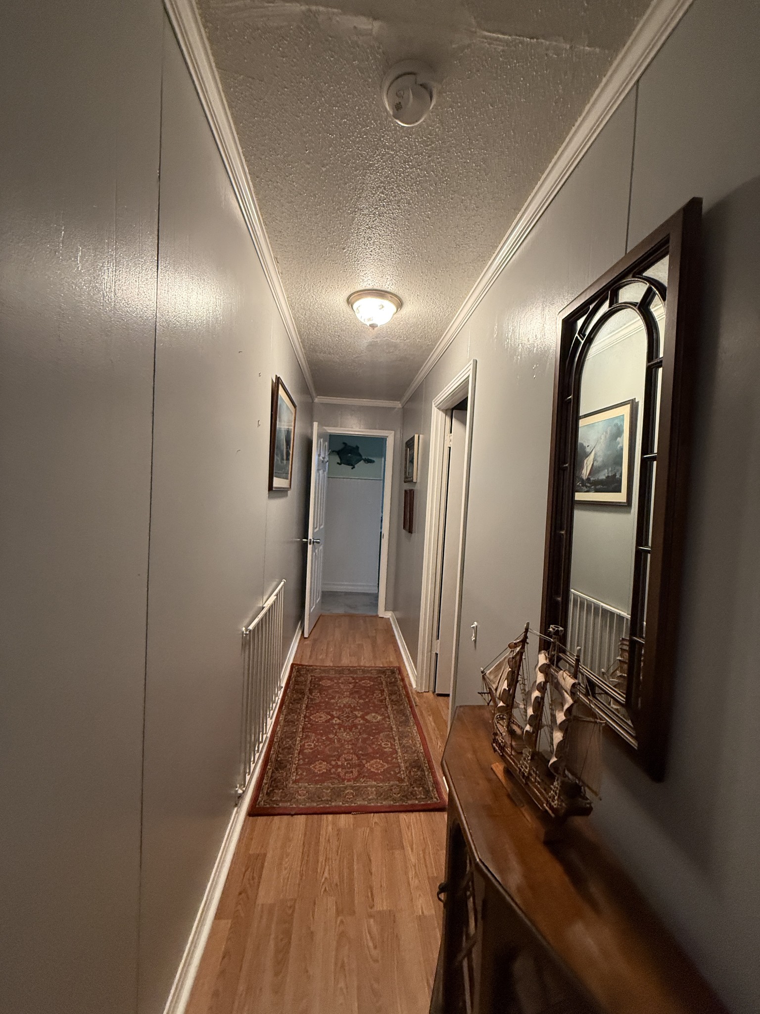 201 South Point Drive Camden, TN 38320 - Photo 15 of 30 a view of a hallway with wooden floor and staircase