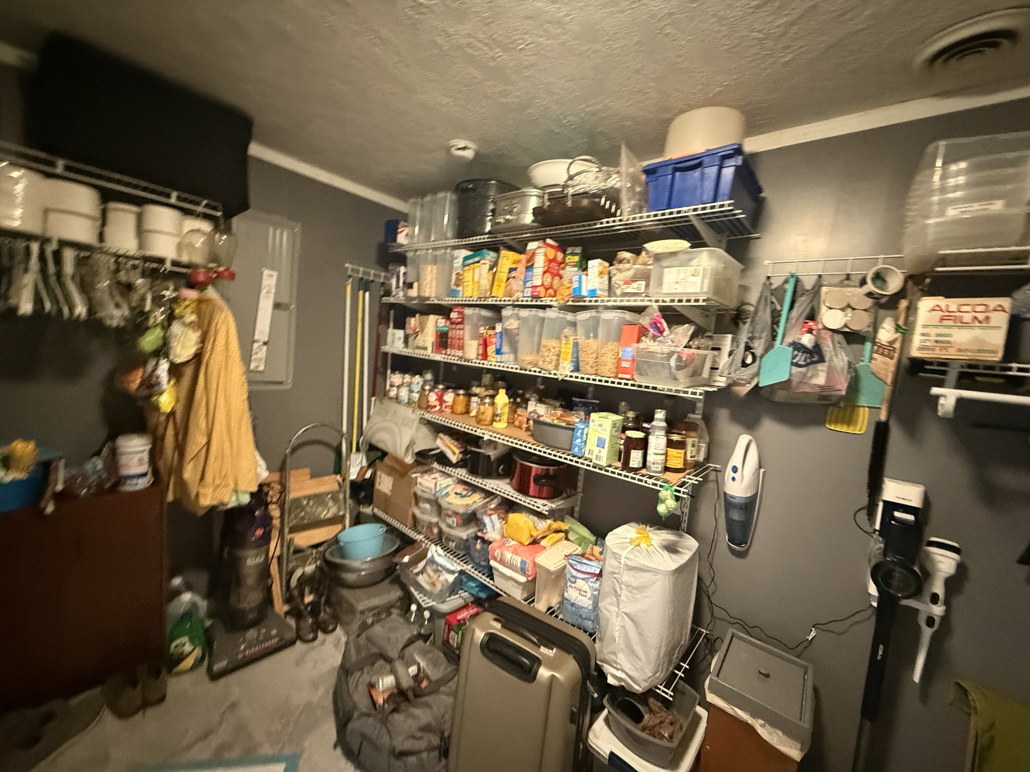 201 South Point Drive Camden, TN 38320 - Photo 21 of 30 a room with lots of different colored cloths