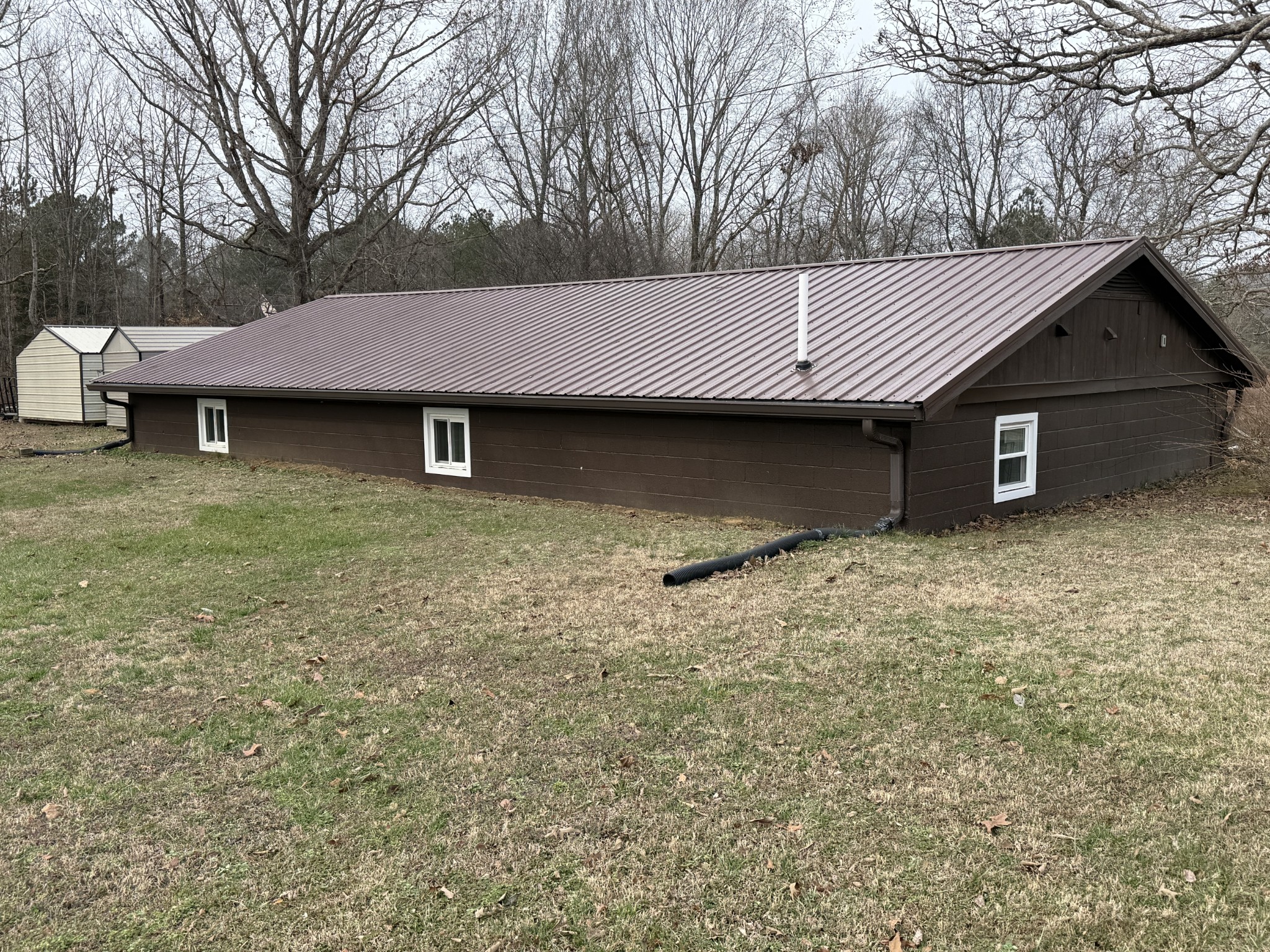 201 South Point Drive Camden, TN 38320 - Photo 5 of 30 a front view of a house with a garden