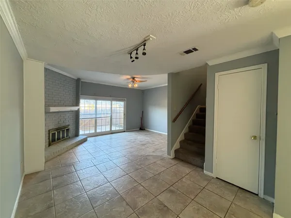 a view of entryway and hall with a window