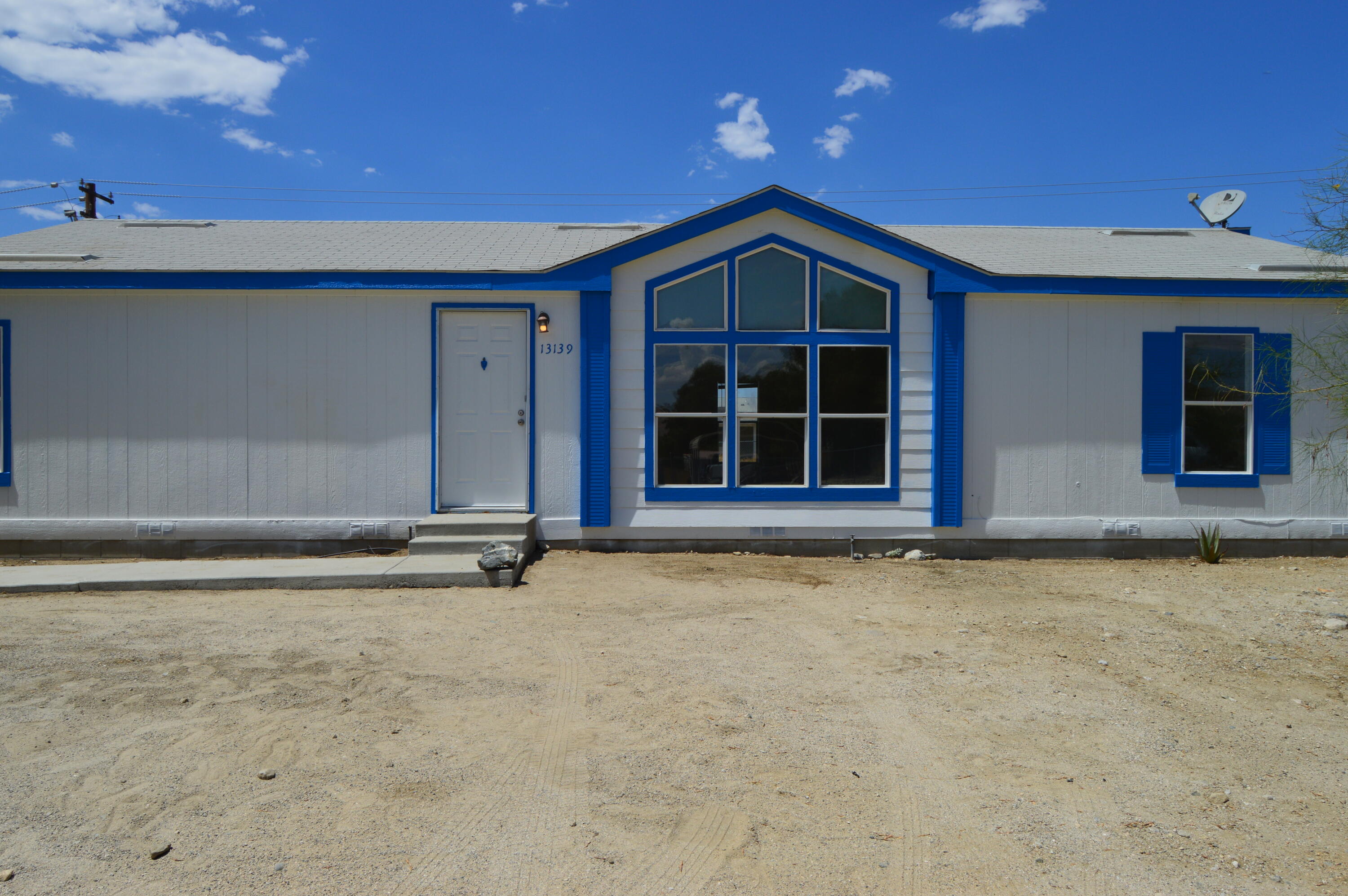 13139 Zane Way Whitewater, CA 92282 - Photo 2 of 12 a view of an entrance of the house