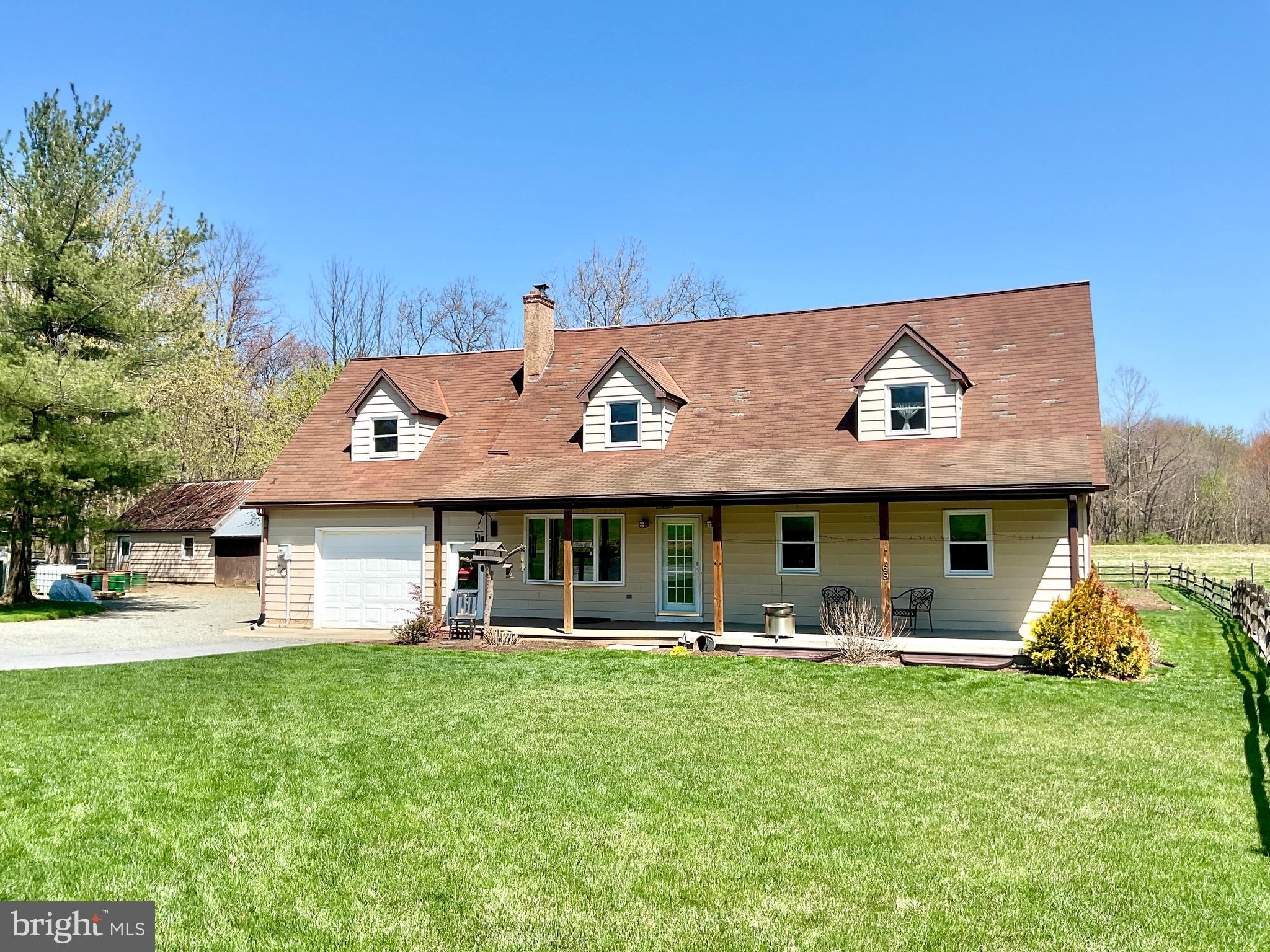 69 Fairview Road New Providence, PA 17560 - Photo 1 of 59 a front view of house with yard and outdoor seating