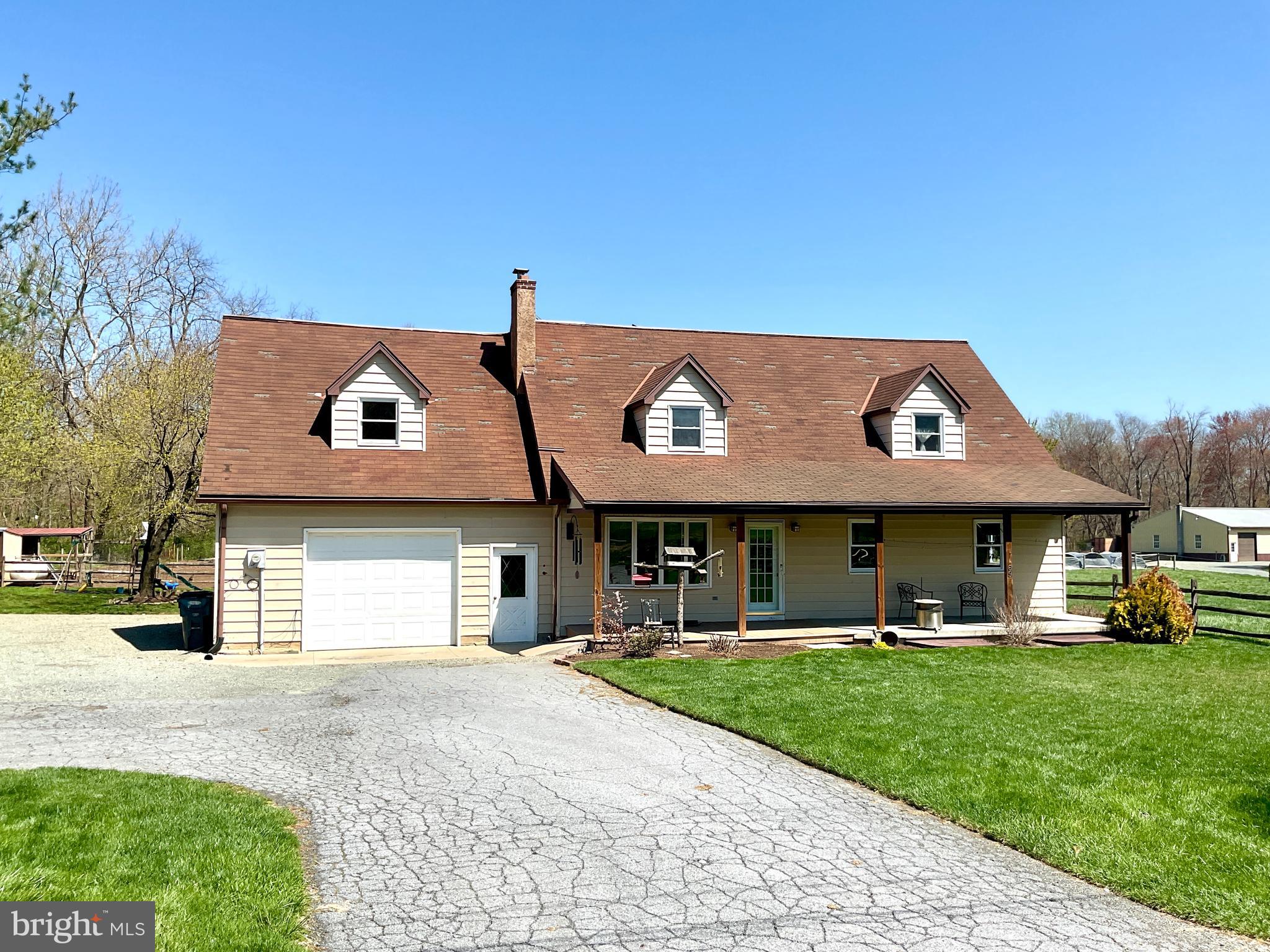 69 Fairview Road New Providence, PA 17560 - Photo 11 of 59 a front view of a house with a yard