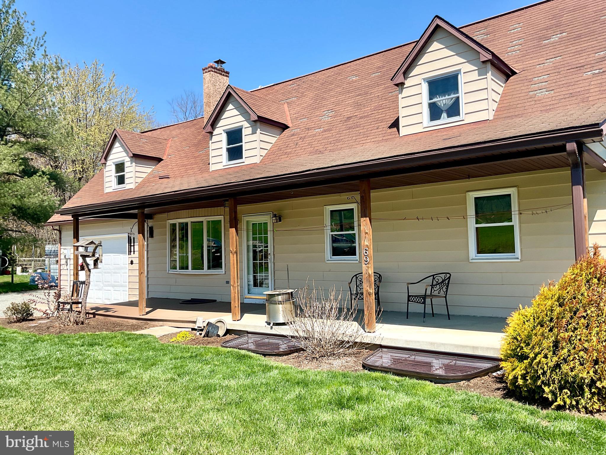 69 Fairview Road New Providence, PA 17560 - Photo 14 of 59 a front view of a house with garden