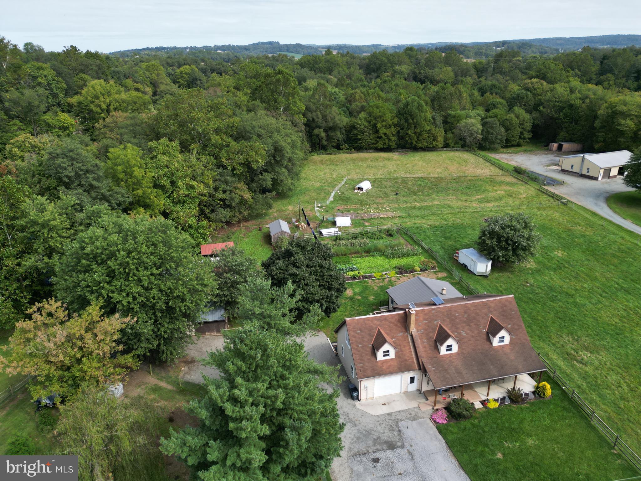 69 Fairview Road New Providence, PA 17560 - Photo 16 of 59 an aerial view of a house with a yard