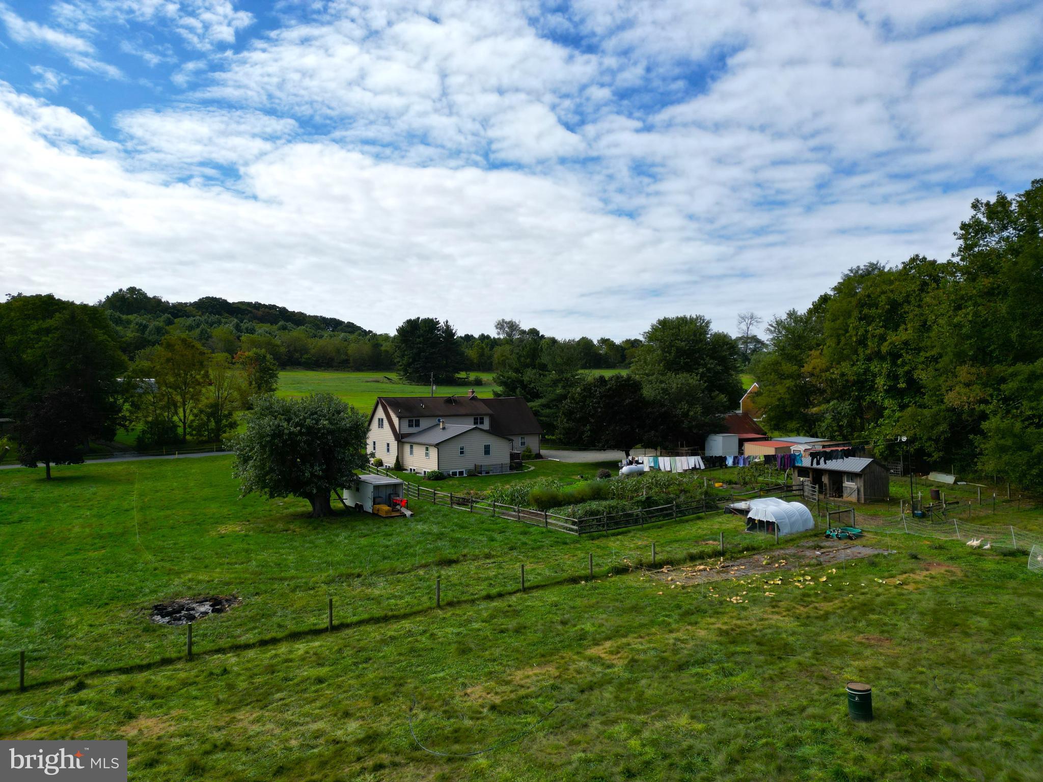 69 Fairview Road New Providence, PA 17560 - Photo 20 of 59 a view of a golf course with chairs and a table