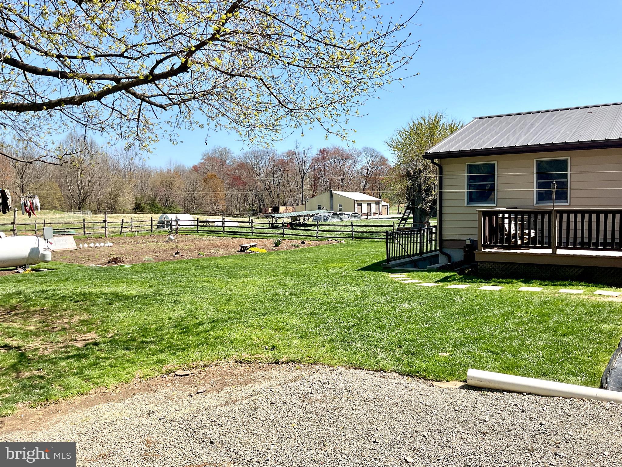 69 Fairview Road New Providence, PA 17560 - Photo 30 of 59 a view of a garden with a slide