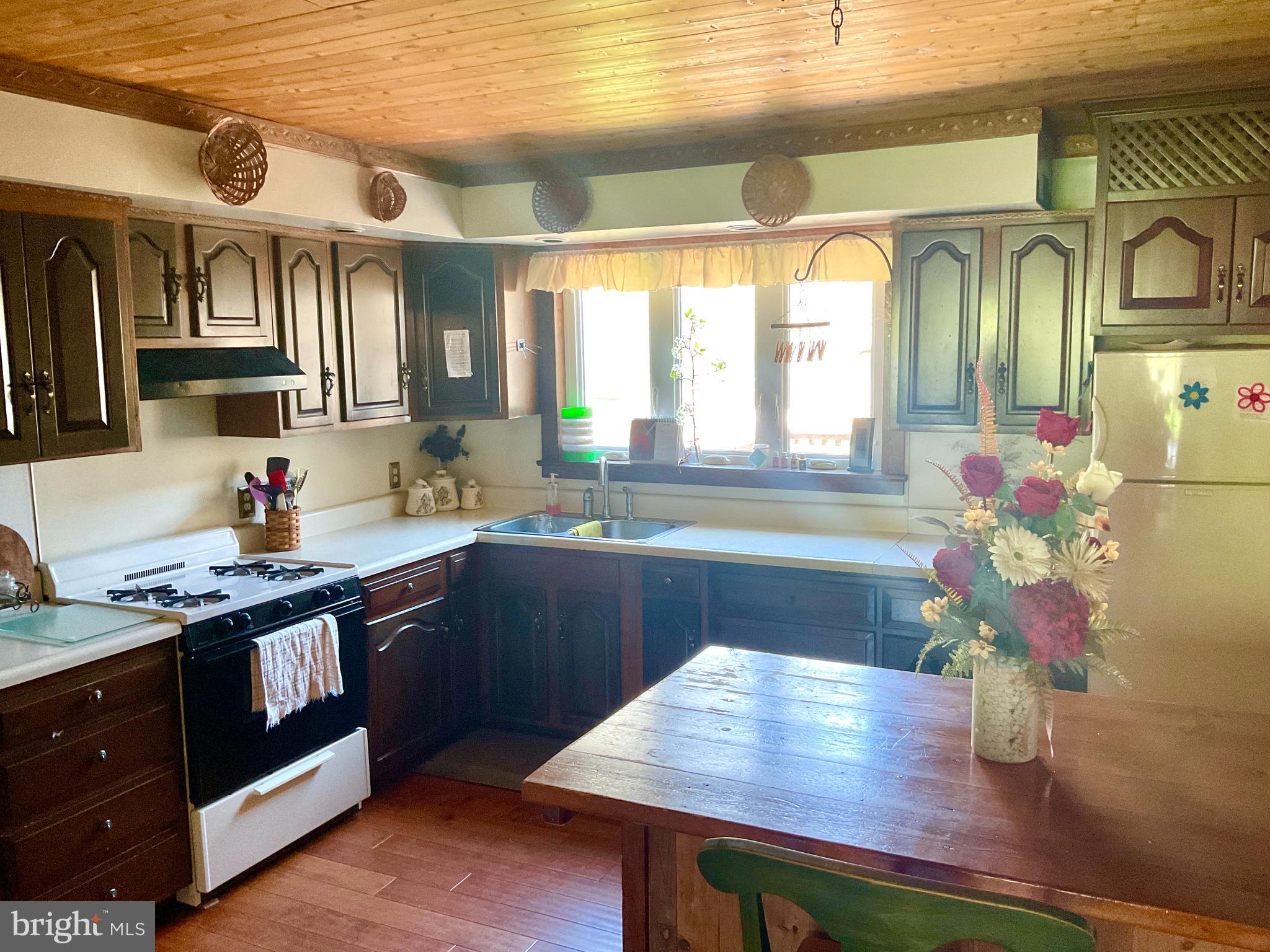 69 Fairview Road New Providence, PA 17560 - Photo 40 of 59 a kitchen with cabinets a sink and appliances