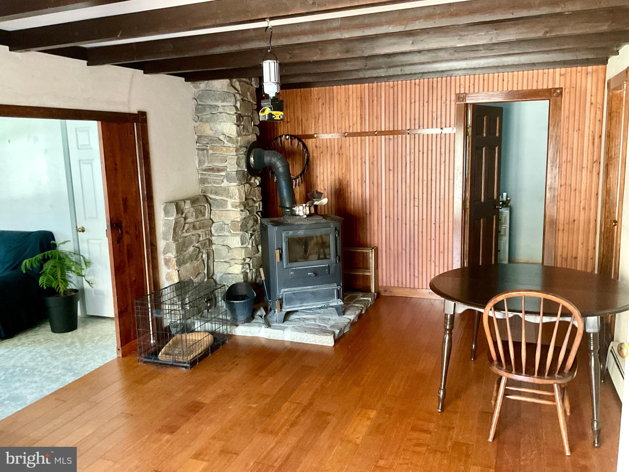69 Fairview Road New Providence, PA 17560 - Photo 43 of 59 a view of a porch with a table and chairs