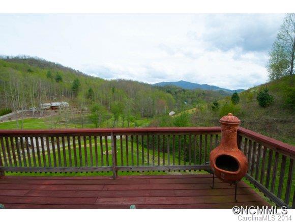 1081 Wesley Creek Road Clyde, NC 28721 - Photo 15 of 24 a view of a wooden bridge