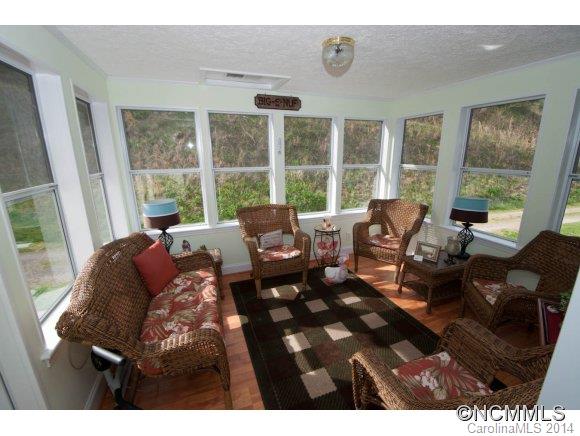 1081 Wesley Creek Road Clyde, NC 28721 - Photo 18 of 24 a living room with furniture and a large window