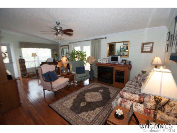 1081 Wesley Creek Road Clyde, NC 28721 - Photo 6 of 24 a living room with furniture and a large window