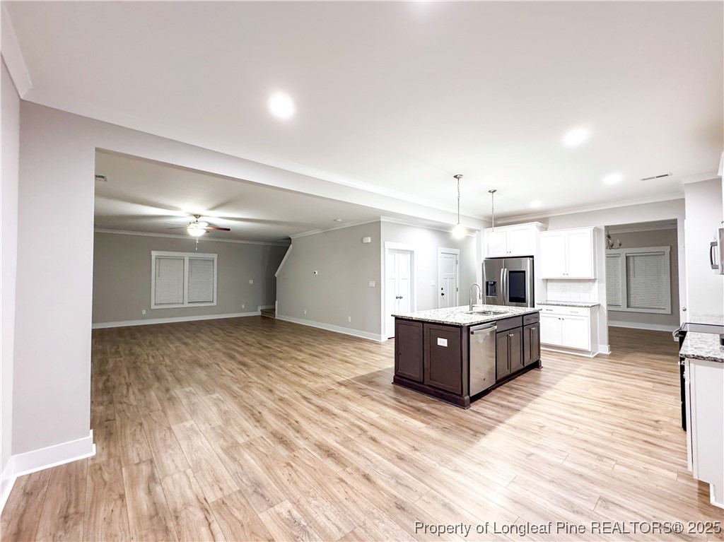 144 Deaton Road Raeford, NC 28376 - Photo 3 of 24 a large room with kitchen view