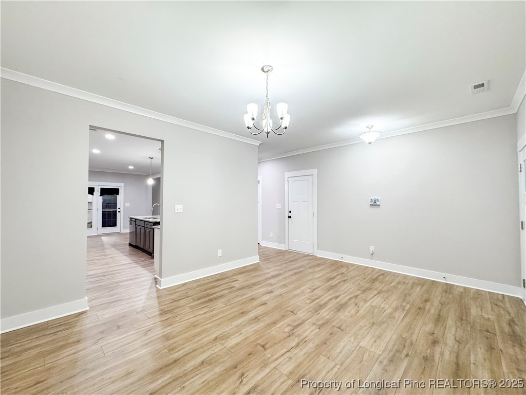 144 Deaton Road Raeford, NC 28376 - Photo 6 of 24 a view of a livingroom with wooden floor
