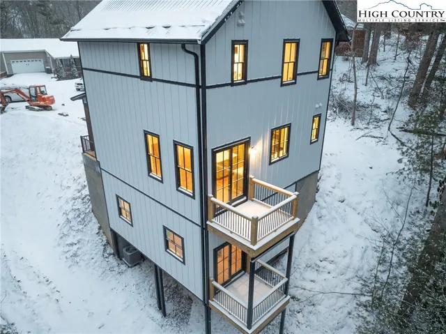 a front view of a building with grey walls
