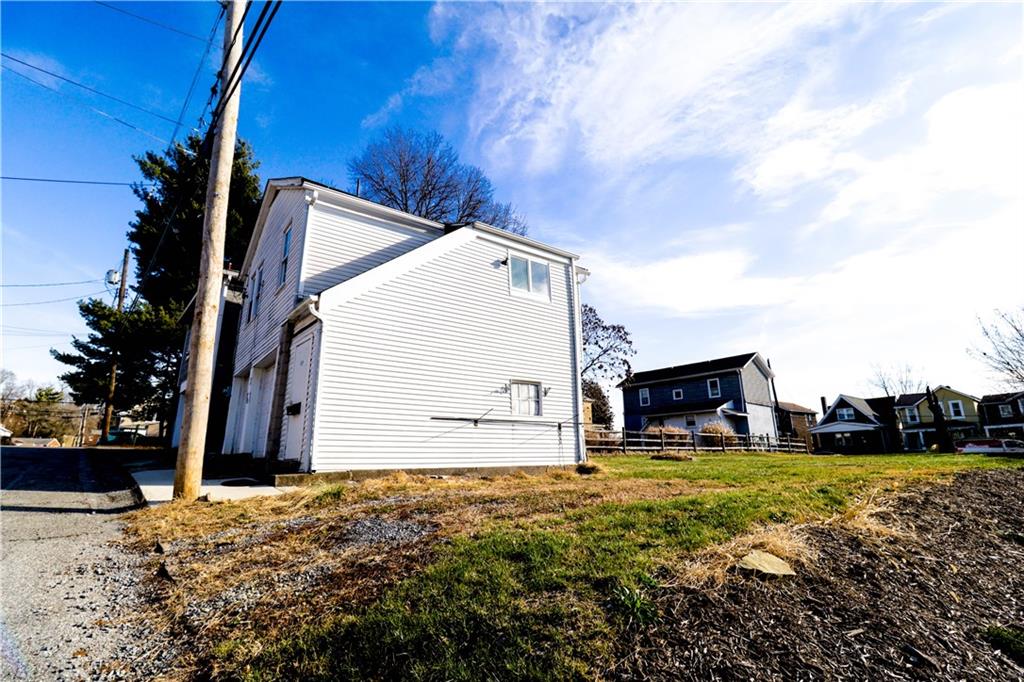 529 Church Street Carnegie, PA 15106 - Photo 4 of 18 a view of a house with backyard and trees