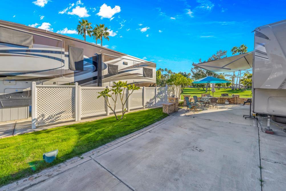 69411 Ramon Road, Unit 776 Cathedral City, CA 92234 - Photo 11 of 17 a view of a backyard