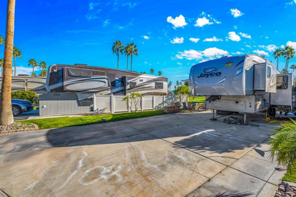 69411 Ramon Road, Unit 776 Cathedral City, CA 92234 - Photo 13 of 17 a view of a backyard with sitting area
