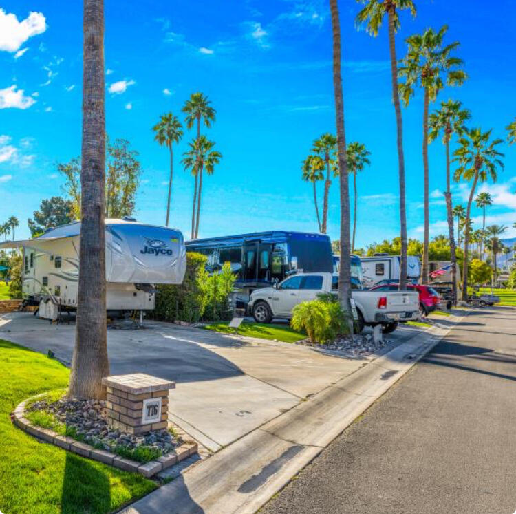 69411 Ramon Road, Unit 776 Cathedral City, CA 92234 - Photo 6 of 17 a front view of a house with garden