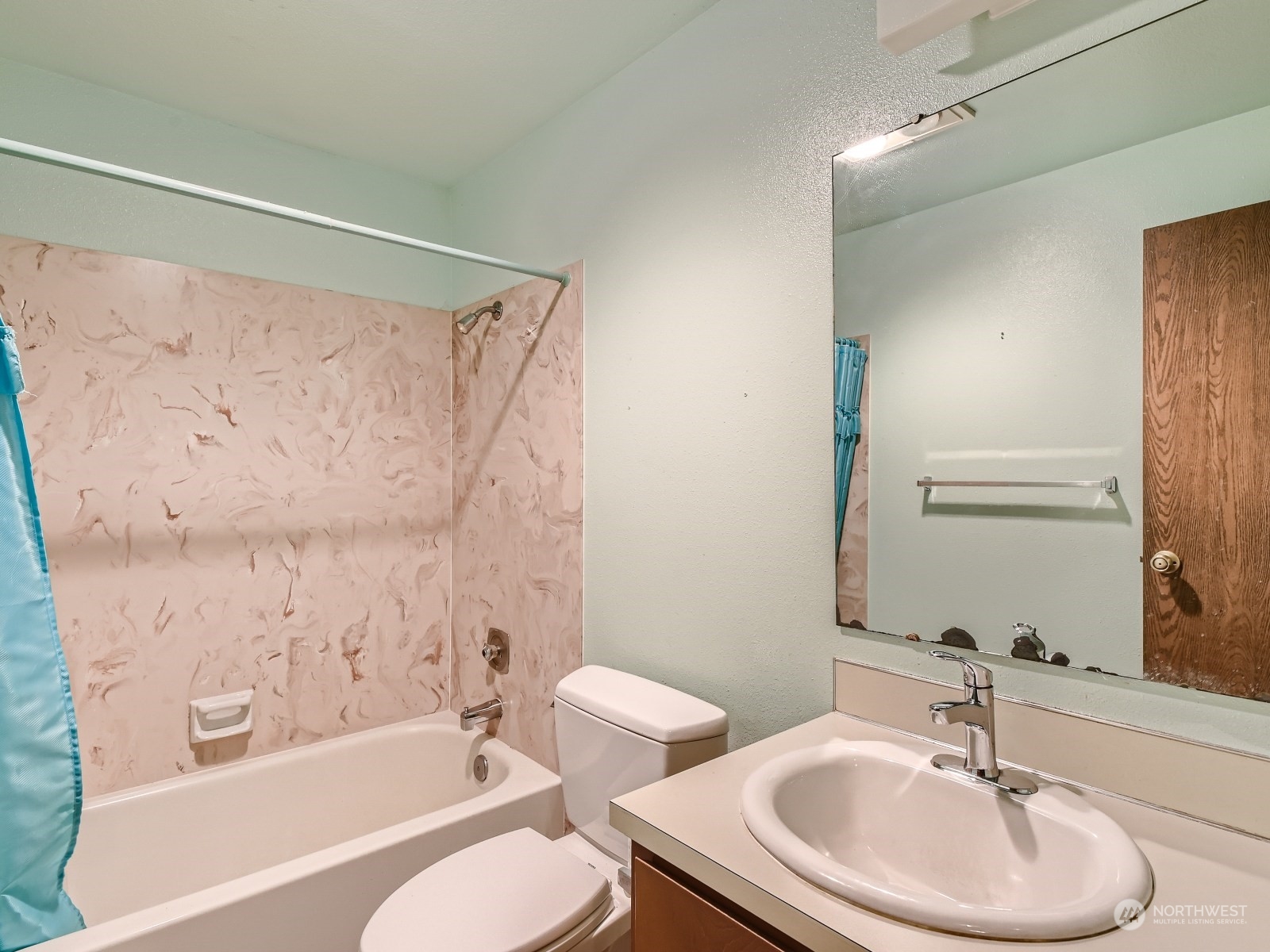 416 213th Street Southwest Bothell, WA 98021 - Photo 11 of 12 a bathroom with a sink toilet and shower