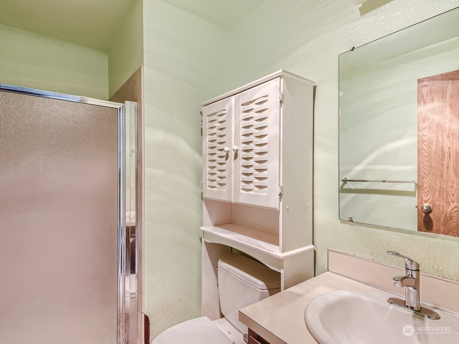 416 213th Street Southwest Bothell, WA 98021 - Photo 8 of 12 a bathroom with a sink and a toilet