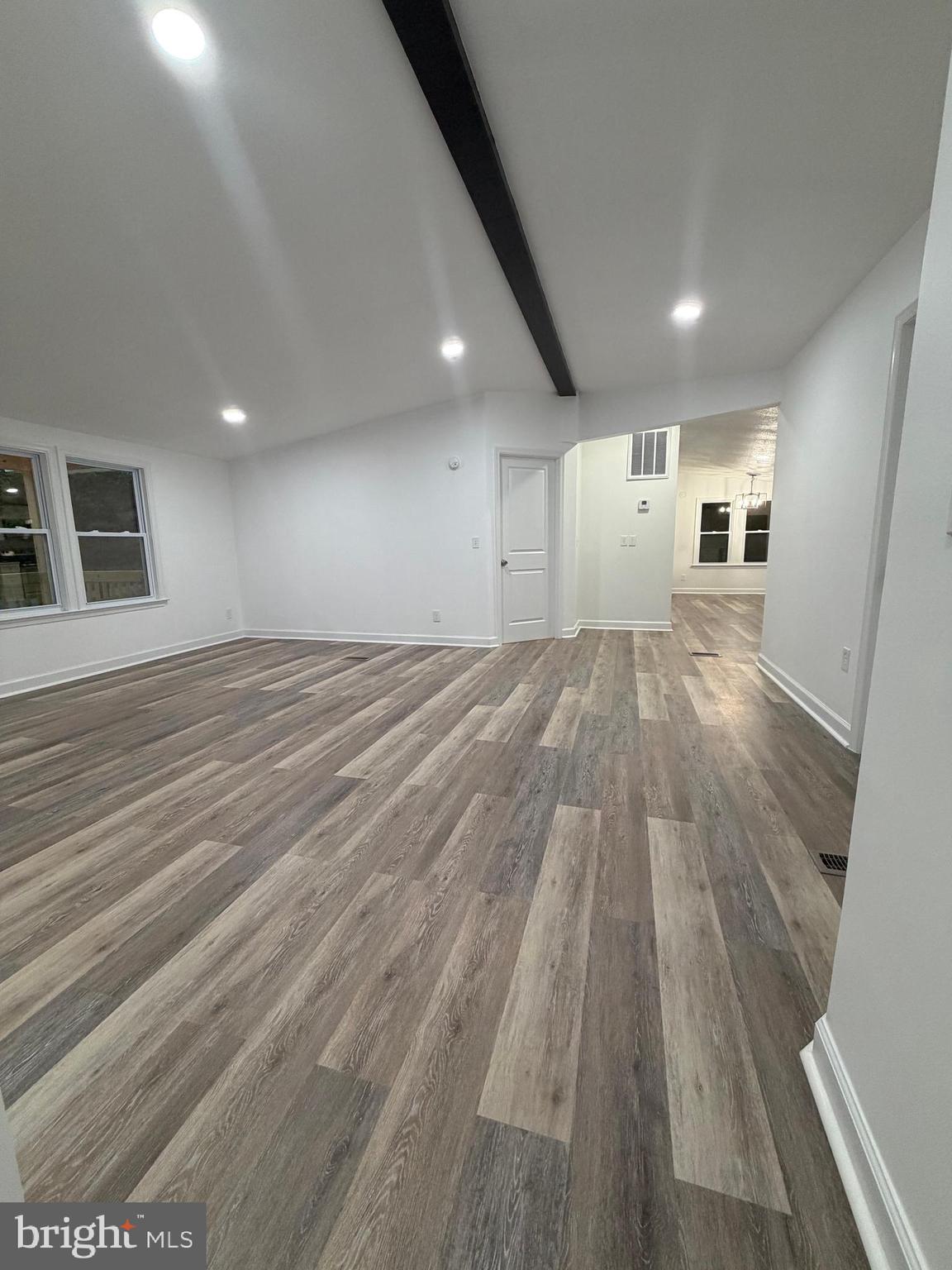 13577 Countyline Church Road Woodford, VA 22580 - Photo 25 of 35 View from Hallway to family room and kitchen
