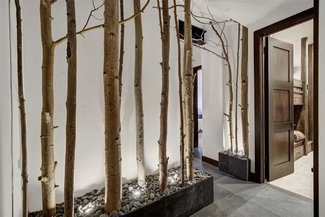 a bedroom with bed and balcony