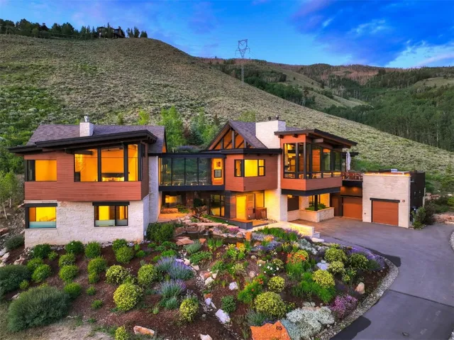 an aerial view of a house with a garden view