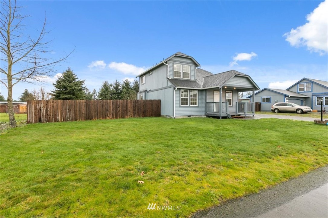 17923 Charlotte Place Southwest Rochester, WA 98579 - Photo 2 of 24 a front view of a house with yard