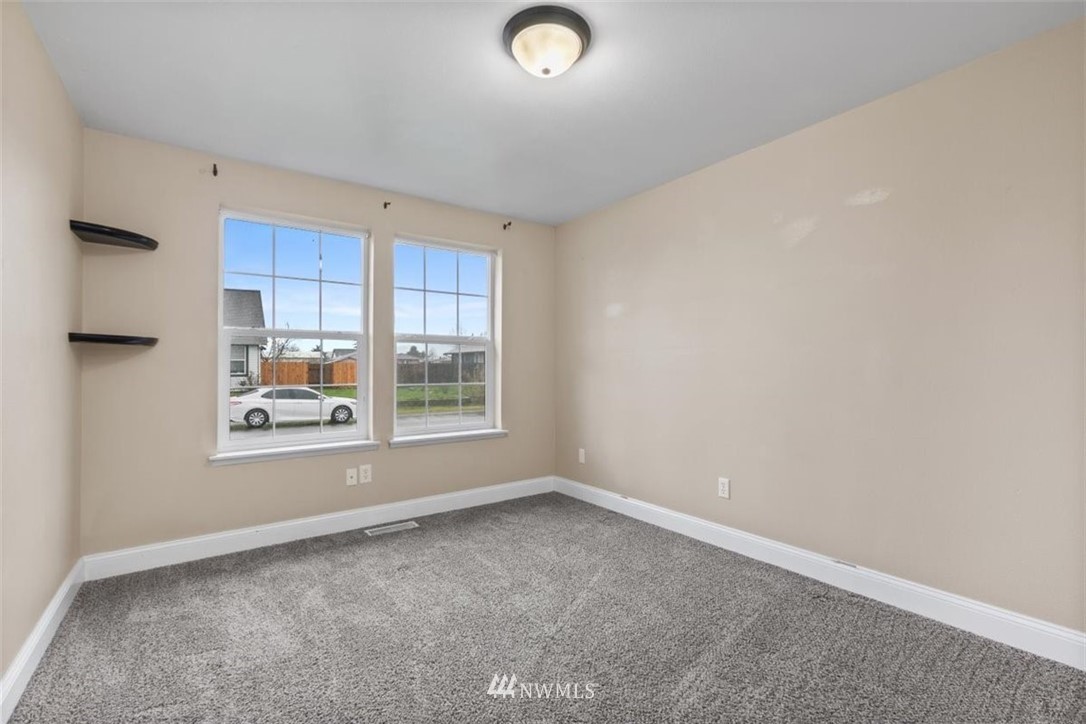 17923 Charlotte Place Southwest Rochester, WA 98579 - Photo 14 of 24 a view of an empty room with a window