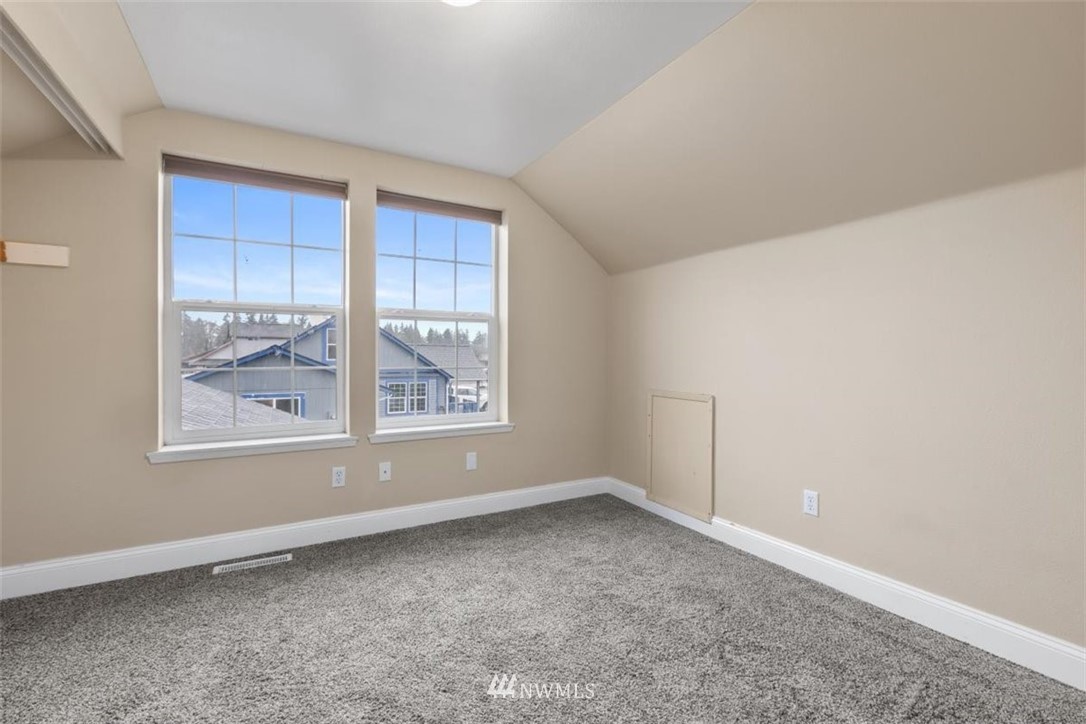 17923 Charlotte Place Southwest Rochester, WA 98579 - Photo 15 of 24 an empty room with a window