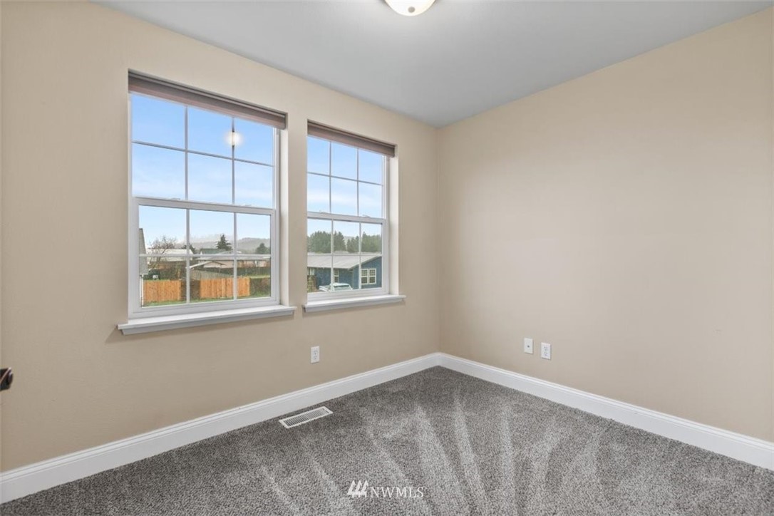 17923 Charlotte Place Southwest Rochester, WA 98579 - Photo 18 of 24 an empty room with a window