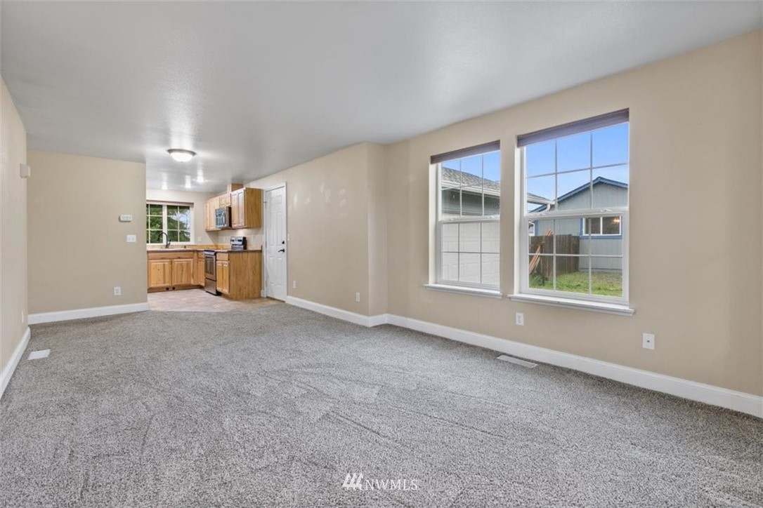 17923 Charlotte Place Southwest Rochester, WA 98579 - Photo 5 of 24 a view of livingroom with a flat screen tv