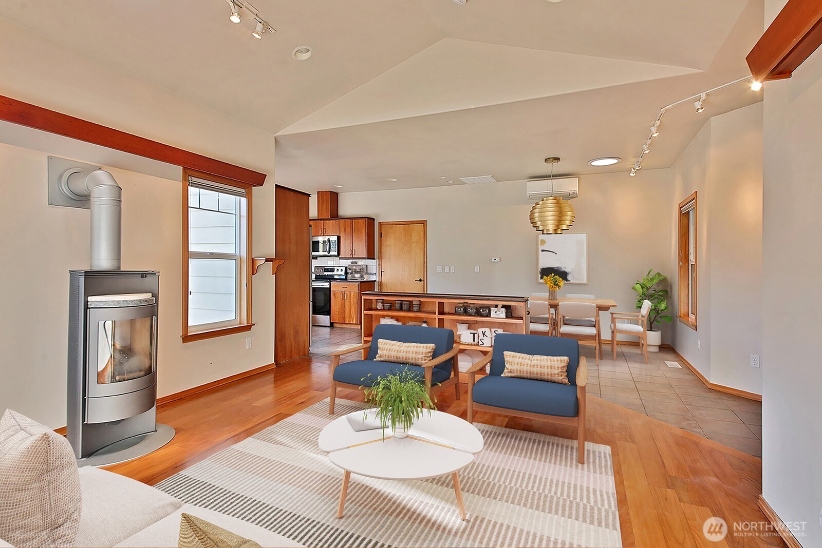 1752 Lee Court, Unit 5 Freeland, WA 98249 - Photo 14 of 38 a living room with furniture and a window