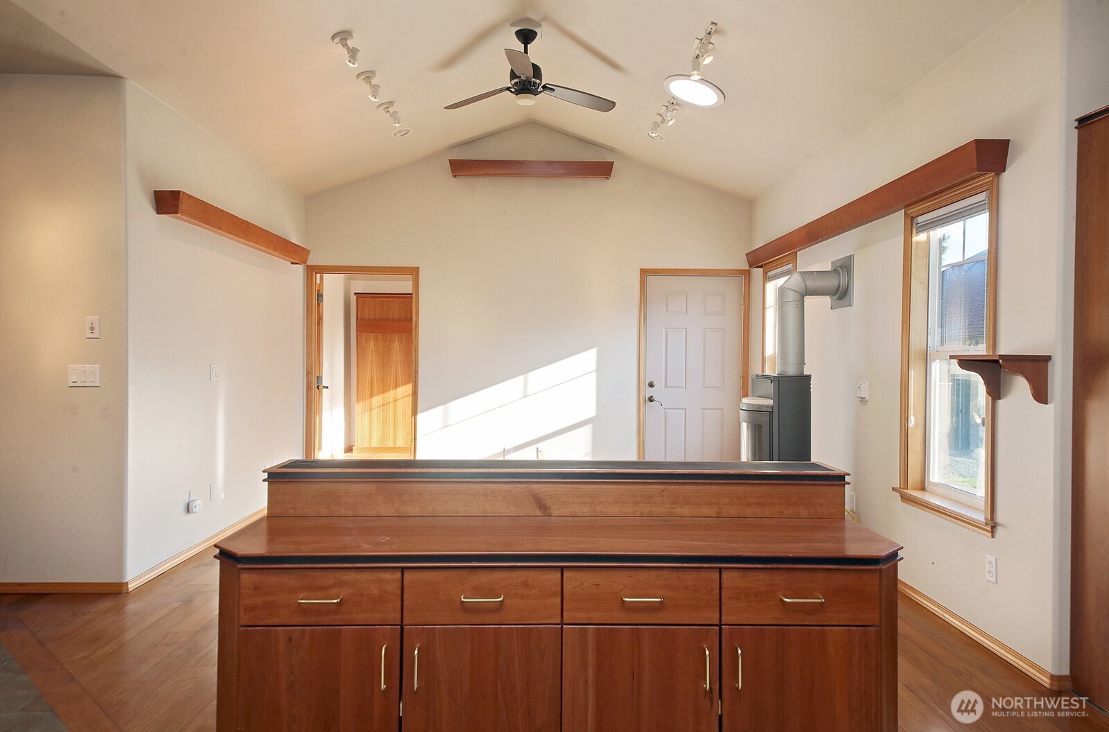 1752 Lee Court, Unit 5 Freeland, WA 98249 - Photo 19 of 38 a bathroom with a sink a mirror and a shower