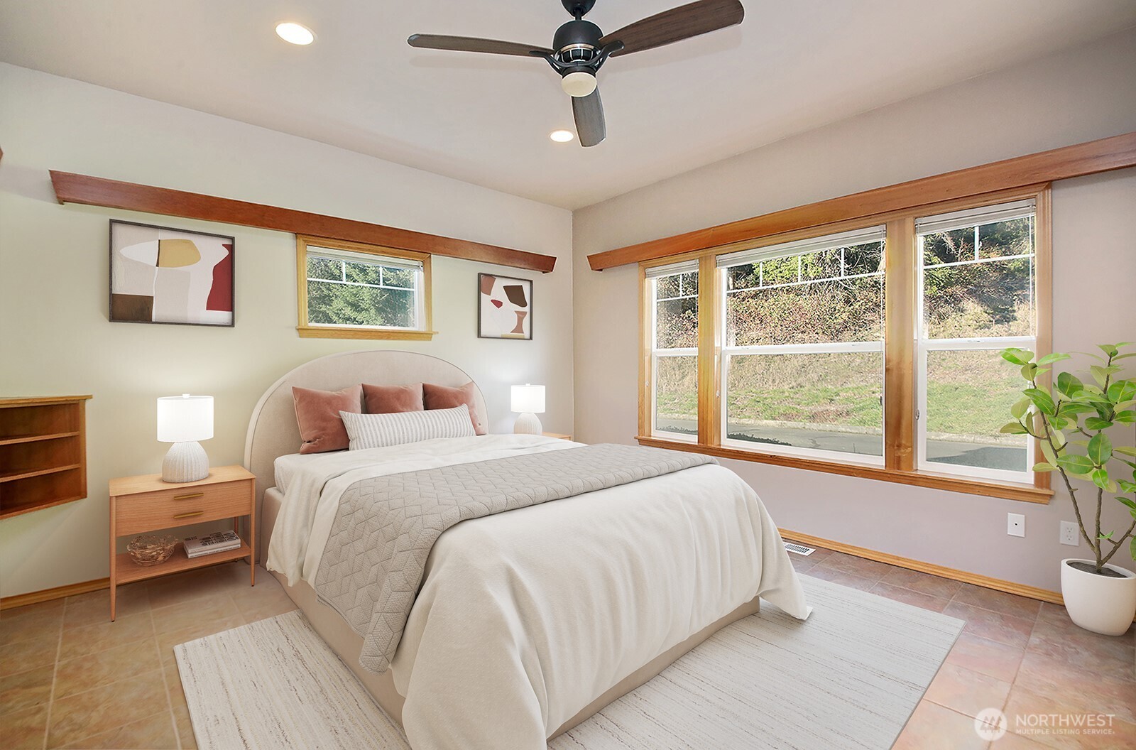 1752 Lee Court, Unit 5 Freeland, WA 98249 - Photo 25 of 38 a bedroom with a large bed and a chandelier