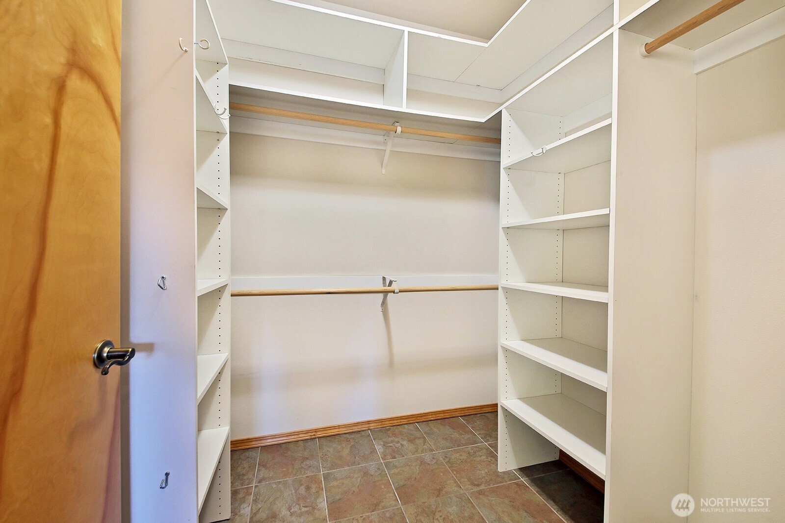 1752 Lee Court, Unit 5 Freeland, WA 98249 - Photo 27 of 38 a view of walk in closet with empty racks