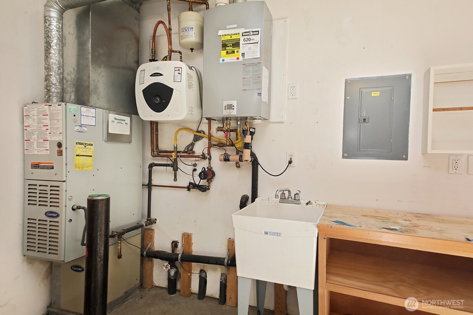 1752 Lee Court, Unit 5 Freeland, WA 98249 - Photo 37 of 38 a bathroom with a sink and a mirror