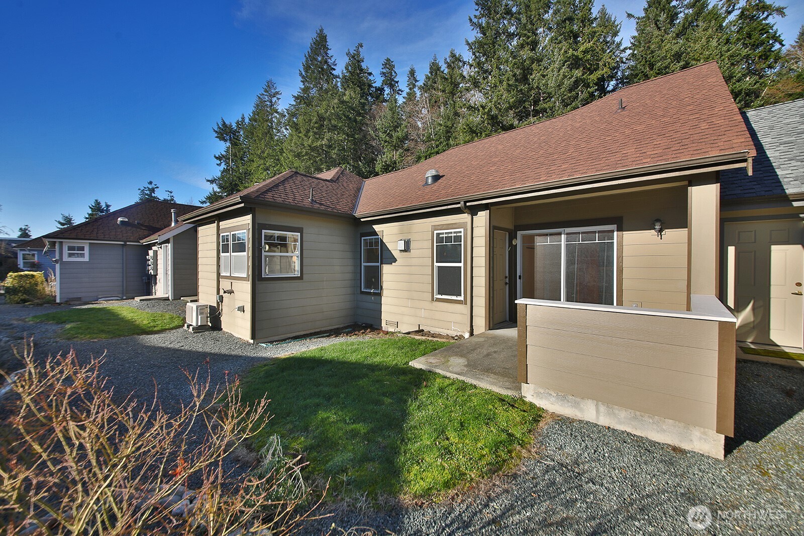 1752 Lee Court, Unit 5 Freeland, WA 98249 - Photo 8 of 38 a view of a house with a yard