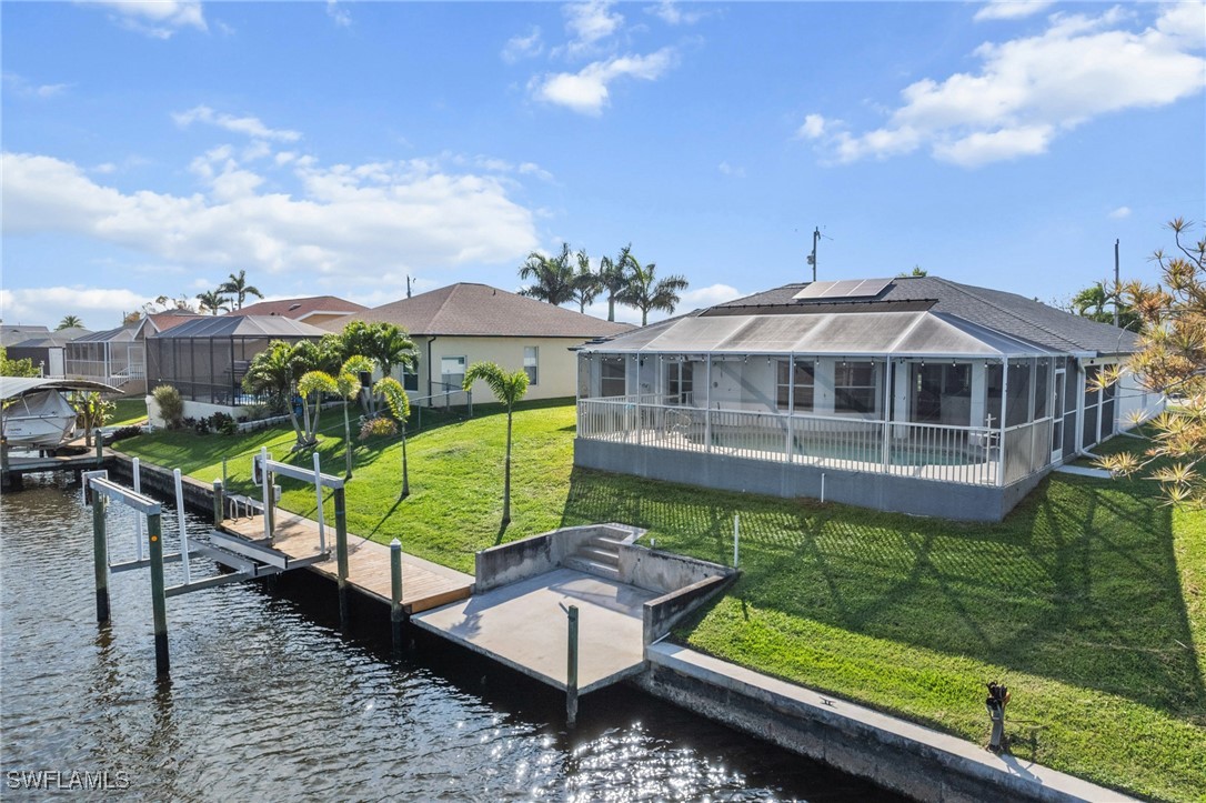 3307 Southwest 2nd Avenue Cape Coral, FL 33914 - Photo 2 of 39 a view of a chairs and table in the terrace