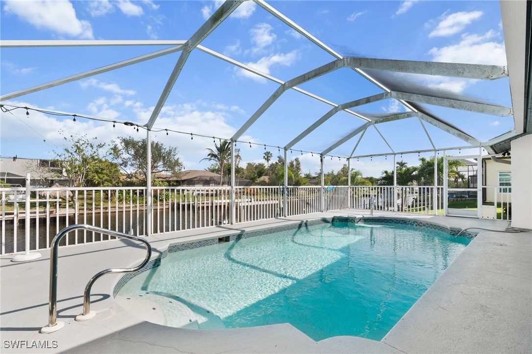 3307 Southwest 2nd Avenue Cape Coral, FL 33914 - Photo 3 of 39 a view of a swimming pool with a patio