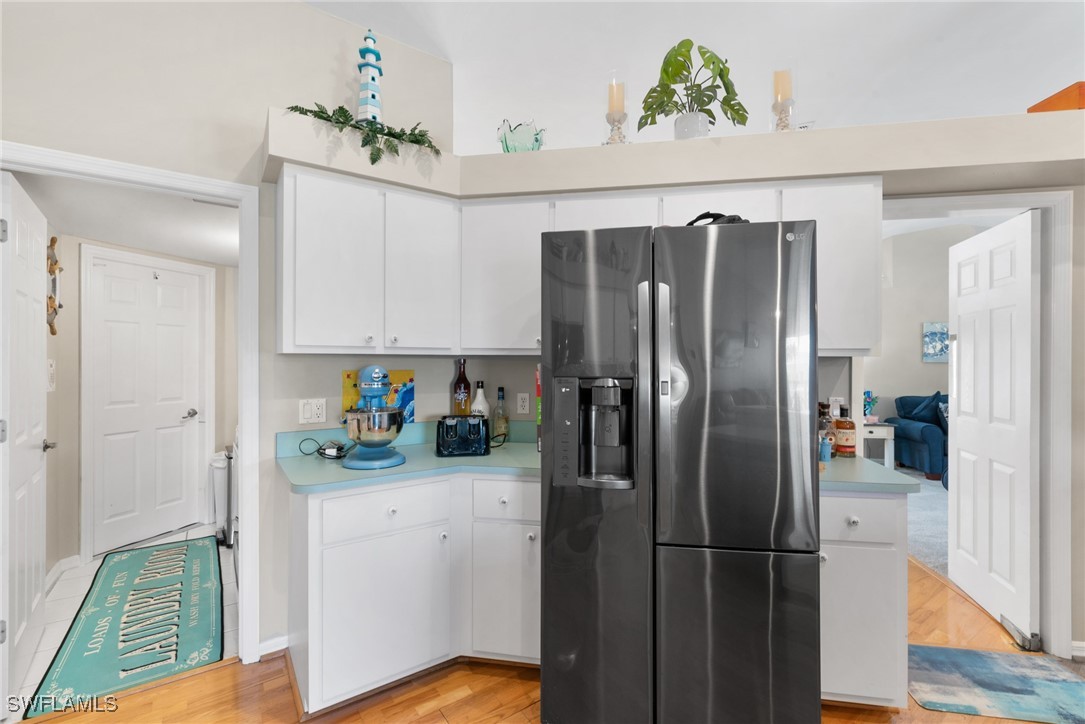 3307 Southwest 2nd Avenue Cape Coral, FL 33914 - Photo 10 of 39 a kitchen with stainless steel appliances a refrigerator and a stove