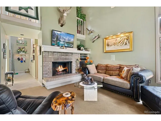 a kitchen with a refrigerator and a stove