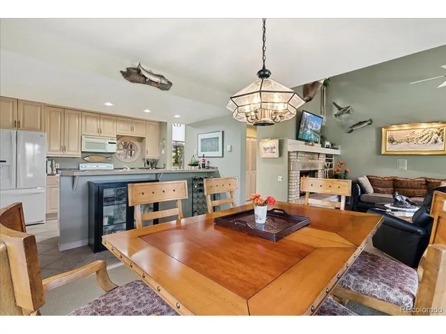 a table tennis table sitting next to a window